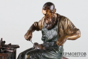 Лампа-подсвечник Еврейский сапожник со спичечницей и миниатюрами. Бронза. Австрия.