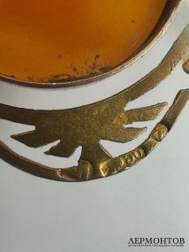 Брошь-камея с профилем девушки. Золото 56 пробы, раковина, мастер Постников, Россия, 1908–1917 годы