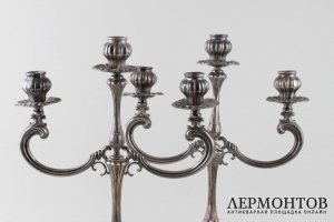 Парные канделябры на три свечи. Серебро 800 пробы. Италия, XX век.