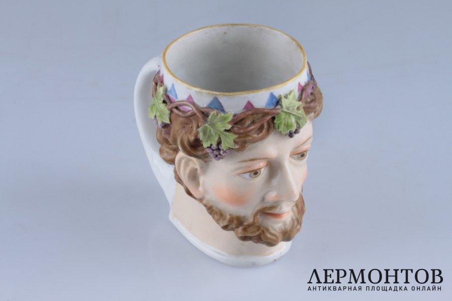 Кружка для вина Голова Вакха. Россия, част. з-д Сафронова, 2 пол.19 в. Фарфор.