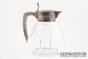 Кувшин для напитков с фигурным туловом. Германия, 1930-е гг. Серебро 800 проба.