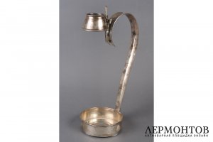 Подставка с ручкой для бутылки. США, фирма A. Adler, 1 пол. 20 в. Серебро 925 пробы.
