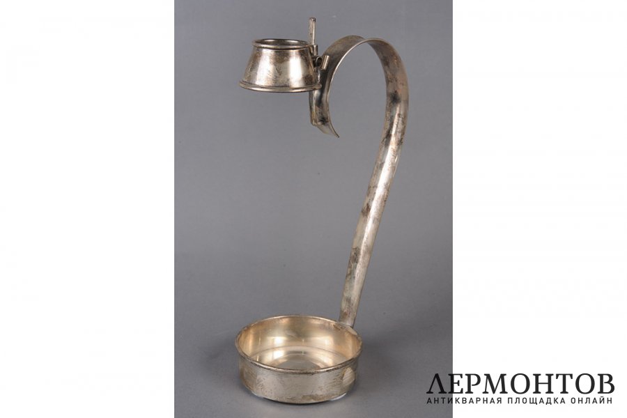 Подставка с ручкой для бутылки. США, фирма A. Adler, 1 пол. 20 в. Серебро 925 пробы.