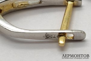 Серьги с английским замком из двухцветного золота 750 пробы с 2 бриллиантами.