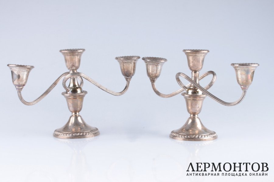 Парные канделябры на 3 свечи. США, фирма Rogers. Серебро 925, литье, чеканка.