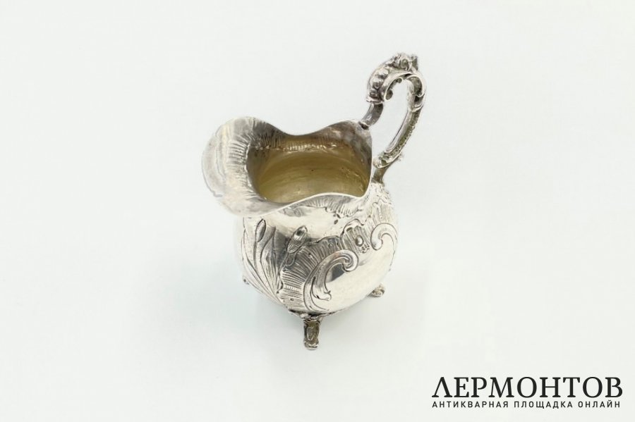 Молочник в стиле неорококо. Германия, середина 19 века. Серебро 800 пробы.