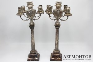 Большие парные канделябры с головами козлов. Серебро. США, 1920-30е гг.