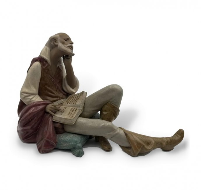 Скульптура «Чтение дворянина» (Дон Кихот). Фарфор грес, Lladro, скульптор Juan Huerta, Испания, 2004–2007 годы