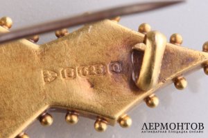 Брошка с рубином. Зап. Европа, 1 пол. 20 в. Золото 625 пробы, 1 рубин, алмазы.